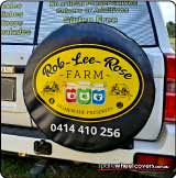 Rob-Lee-Rose Farm business advertising on a Nissan Patrol spare tyre cover