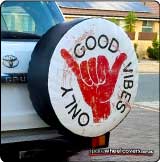 Toyota Landcruiser spare tyre cover with Godd Vibes Only graphic on it