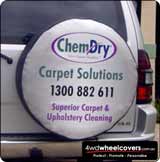 Chemdry business advertising on a spare wheel cover.