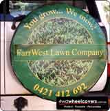 Nissan Patrol spare wheel cover with Farrwest Lawn Company design.