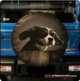 Spare tyre cover on Suzuki Jimny with a dog photo