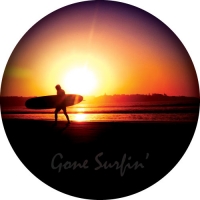 Surfer at beach sunset with Gone Surfin printed in high quality on your spare tyre cover.